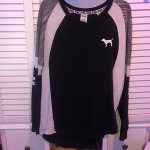 a medium pink sweater
